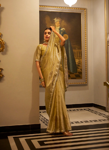 Gorgeous Gold Tissue shimmer saree with zari weaving and sequin lace